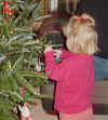 Anna_DecoratingTree_02.jpg (33203 bytes)