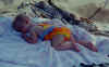 Anna_SleepingBeach_Aug2001.jpg (31433 bytes)
