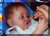 During_Annas_first_food.jpg (22556 bytes)