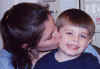 mommy_kissing_jackson_April02.jpg (35764 bytes)